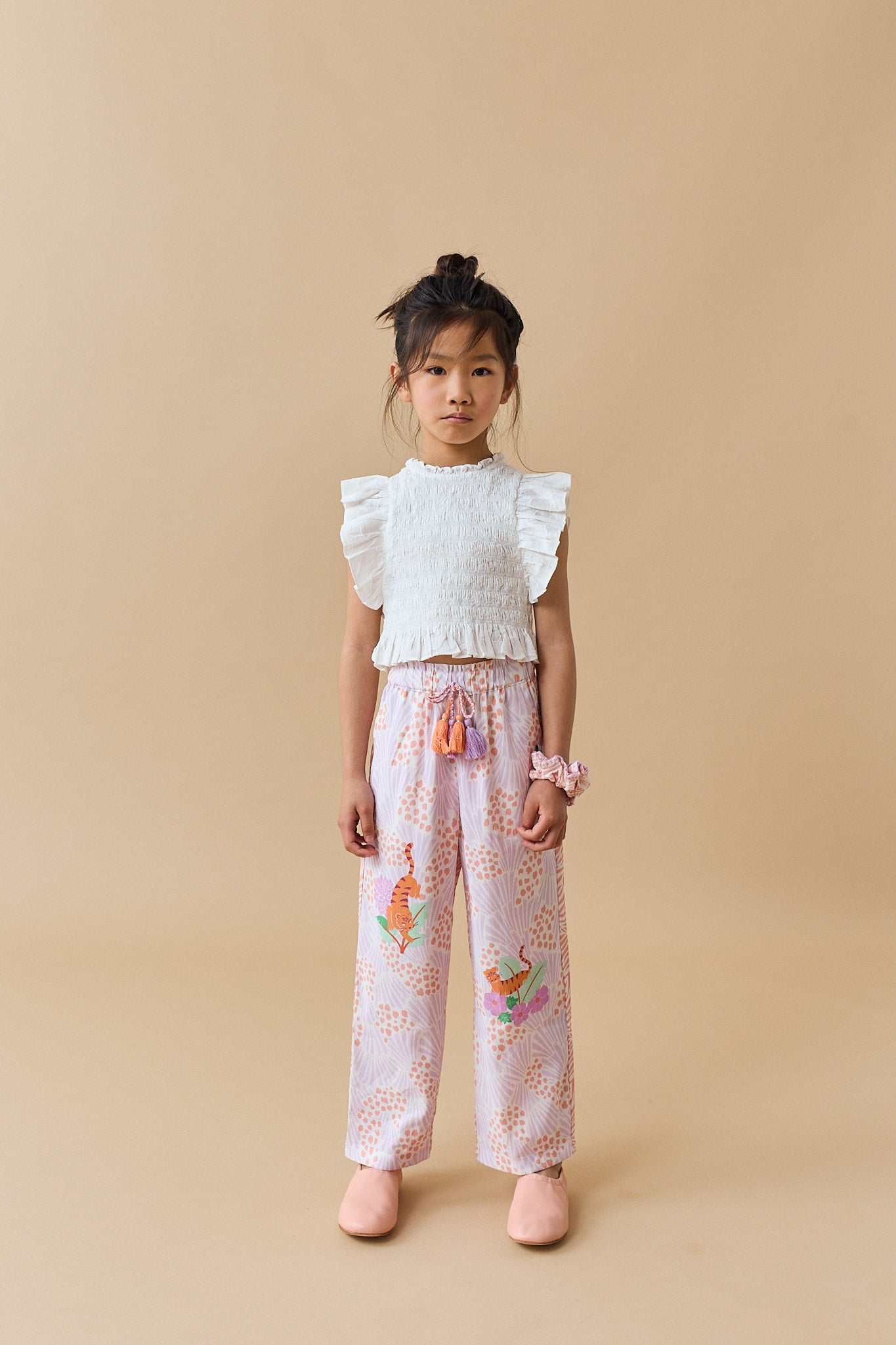 JACQUIE TOP WITH PEPLUM RUFFLES