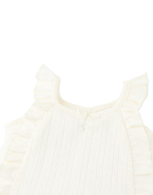 Baby Freyja Diamond Row Pointelle Jersey Knit with Ruffles & Rosette Details front view