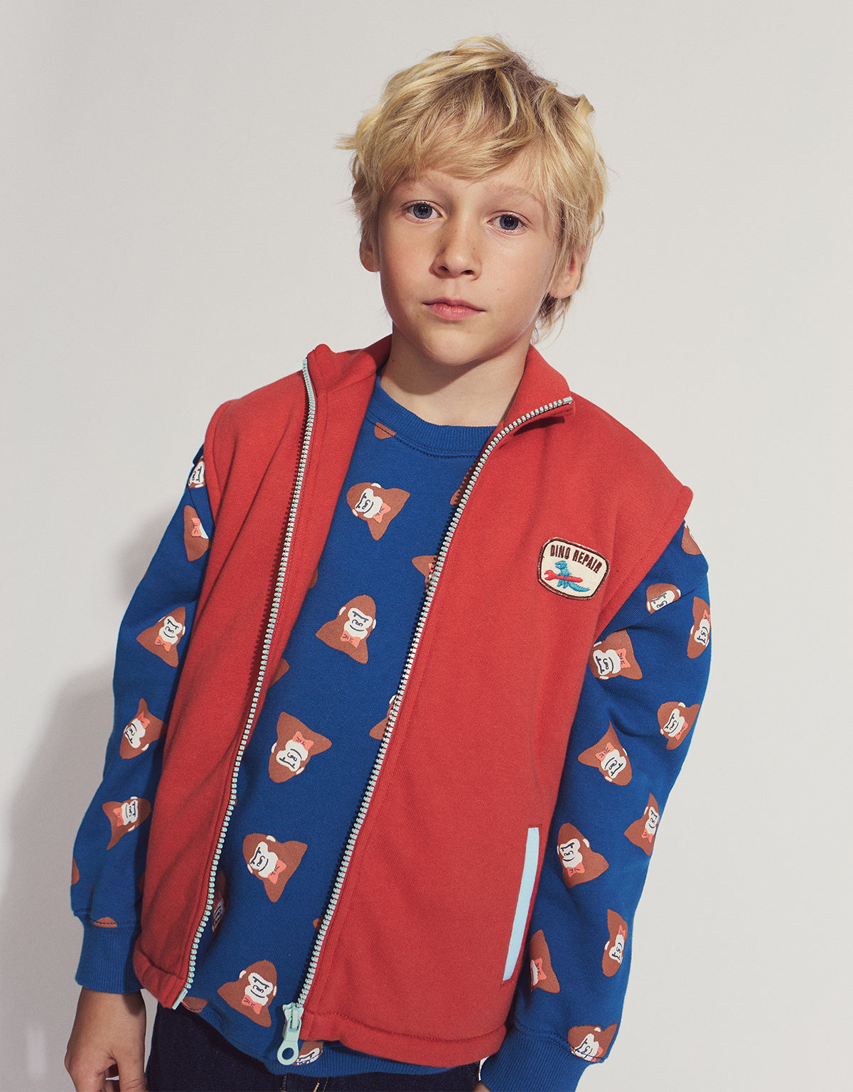 PHOENIX ZIP-UP GILET PAPRIKA WITH CONTRAST TRIM AND EMBROIDERED PATCH