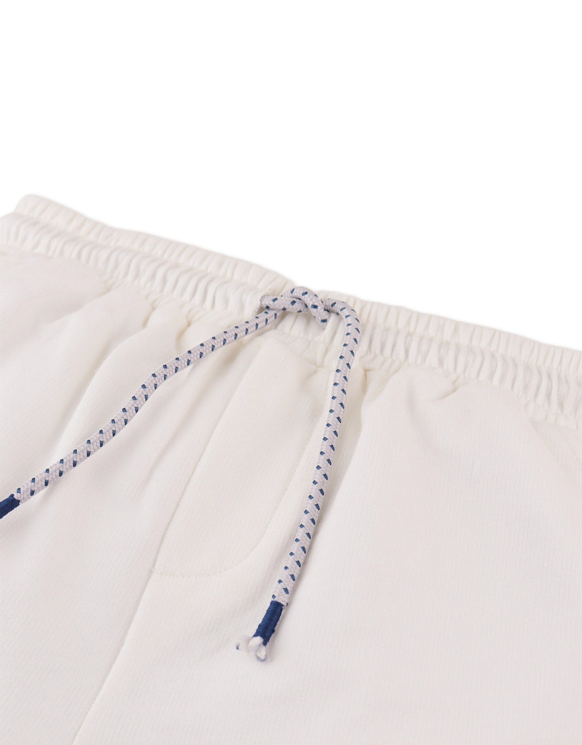 Flatlay front view of the Tim Drawstring Shorts with Embroidered GG Logo in white with drawstring and embroidery details from the streetwear-inspired collection of Filipino kids fashion brand Gingersnaps Philippines.