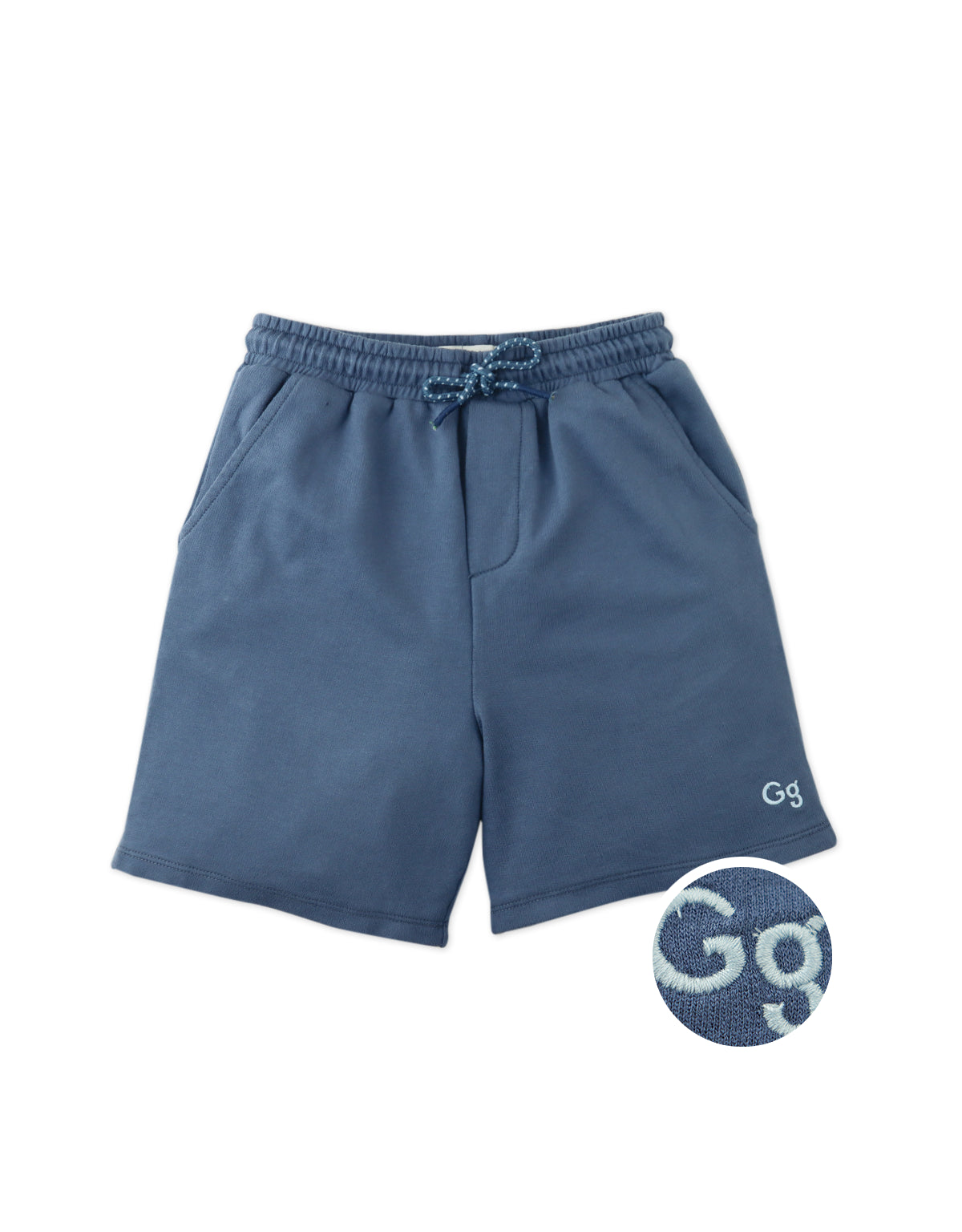 Close-up front detail of the Tim Drawstring Shorts with Embroidered GG Logo in blue, highlighting the French terry fabric, drawstring waistband, and embroidered logo from the streetwear-inspired collection of Gingersnaps Philippines.