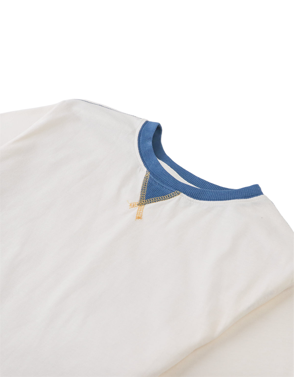 Details front photo of Julien V-Patch Tee in off-white, showing sharp V-patch neckline detail and soft cotton texture, from the Holiday collection of Filipino kids fashion brand Gingersnaps Philippines.