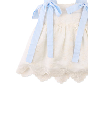 Flatlay front view of the Leilani Embroidered Top with Bow Tie Straps, showcasing embroidery placement and scalloped hem from the Spring Summer collection of Filipino kids fashion brand Gingersnaps Philippines.