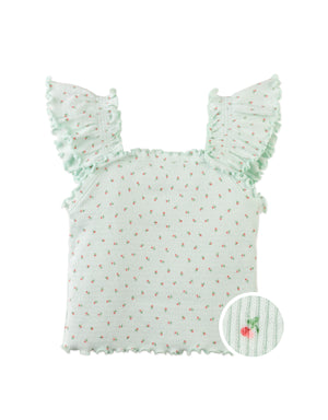 Campaign photo of the Noelle Top with Ruffle Sleeves from the Pastel Cherry Chic for Girls collection, featuring soft flutter sleeves and a fresh pastel tone.