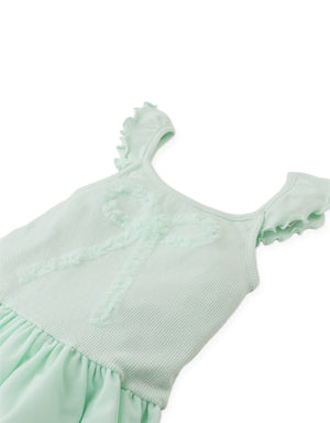 Flatlay front view of the Elara Dress showcasing its layered tulle skirt and delicate structure.