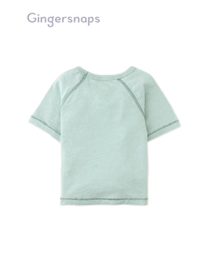 Full back photo of Baby Kevin Jersey Raglan Tee in green showing a relaxed baby fit and smooth back finish, from the Holiday collection of Filipino kids fashion brand Gingersnaps Philippines.
