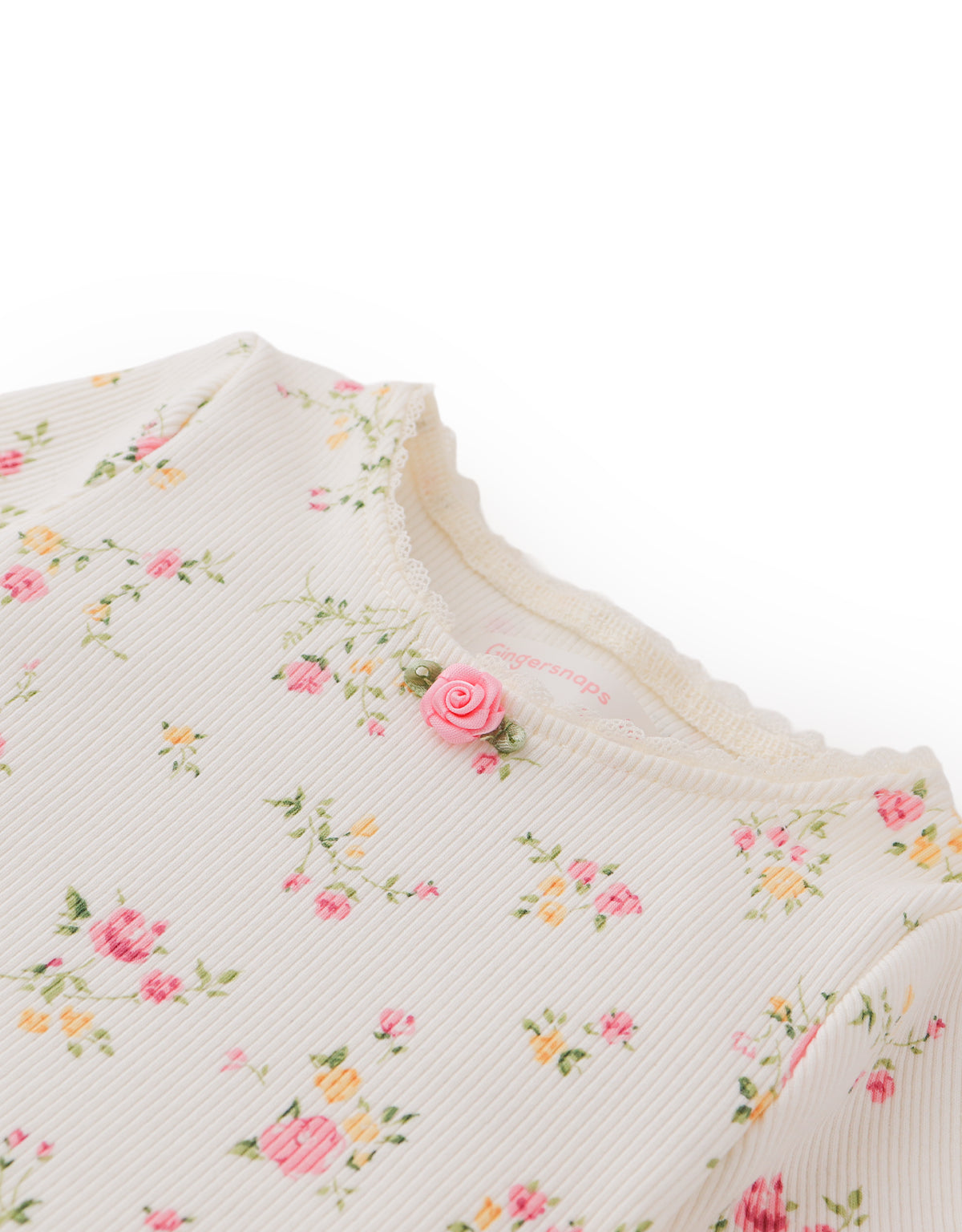 BABY DARA ALL-OVER PRINT TOP WITH LACE AND ROSETTE DETAILS
