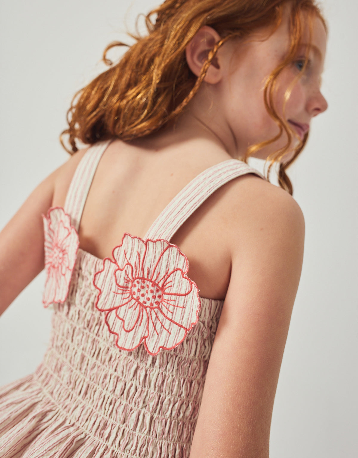 Josephine Striped Peplum Top with Flower Appliqué outfit styling