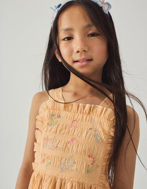 Emily Ruffled Apron Dress with Botanical Embroidery front view
