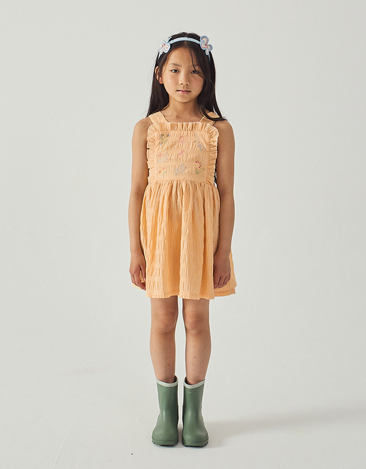 Emily Ruffled Apron Dress with Botanical Embroidery style detail