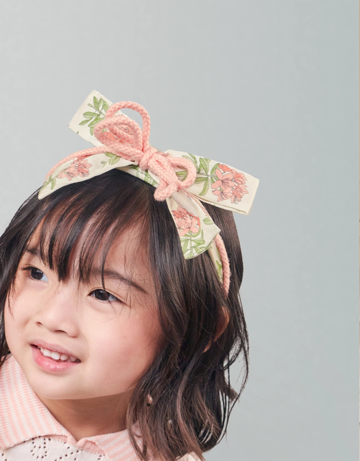 PENTH PRINTED FABRIC HEADBAND WITH CORDED BOW