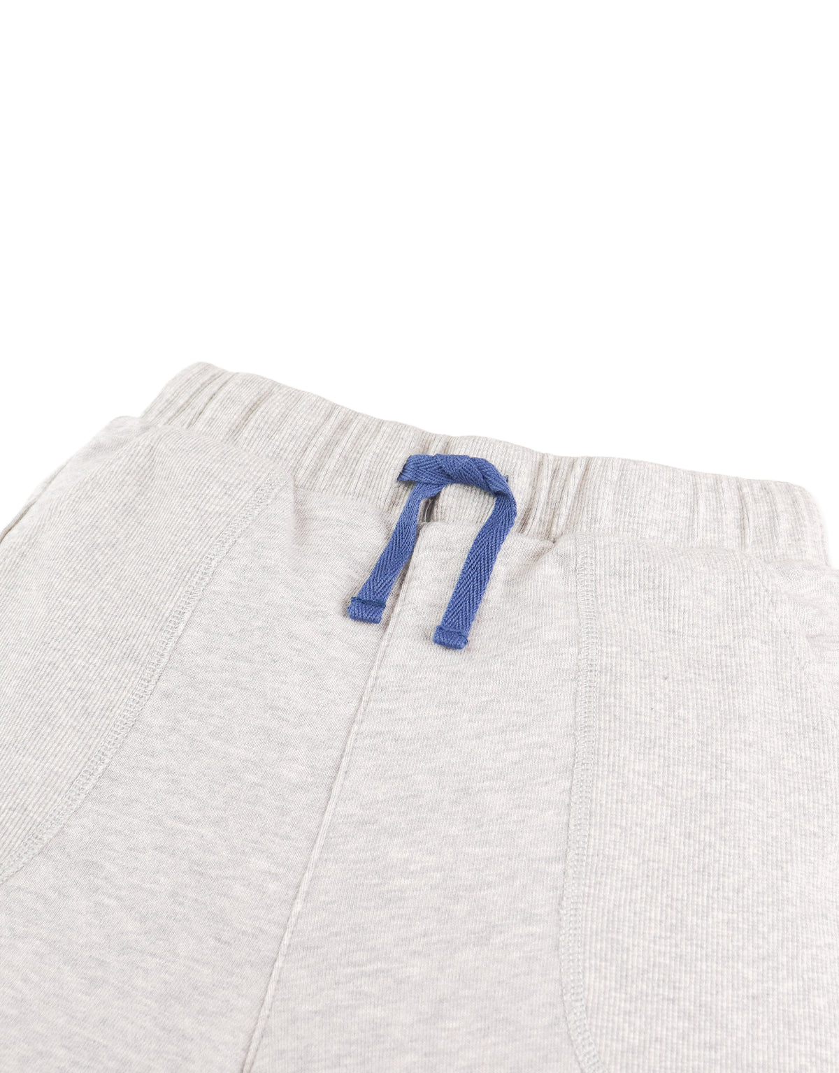 Detail front photo of Miles Pull-On Shorts in gray, focusing on the elastic waistband and cotton fabric surface, from the Holiday collection of Filipino kids fashion brand Gingersnaps Philippines.