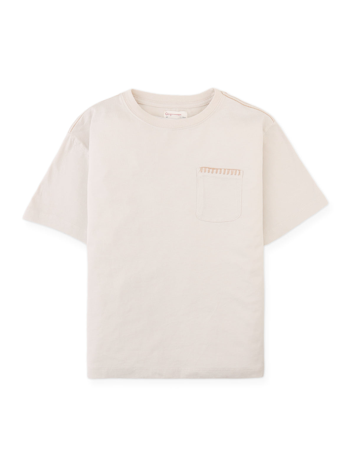 Details front photo of Casper Tee with stitched pocket in warm beige, showing fine stitch work and pocket detail, from the Holiday collection of Filipino kids fashion brand Gingersnaps Philippines.