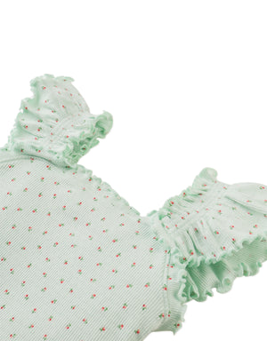 Flatlay front view of the Noelle Top showcasing its clean neckline and airy silhouette.