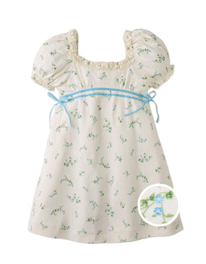 Campaign photo of the Giselle Puff Sleeves Dress with Satin Ribbon Trim on Waist from the Pastel Cherry Chic for Girls collection, featuring floral prints and satin ribbon detail.