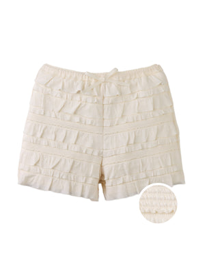 Campaign photo of the Brielle Shorts with All-Over Ruffles and Satin Bow from the Pastel Cherry Chic for Girls collection