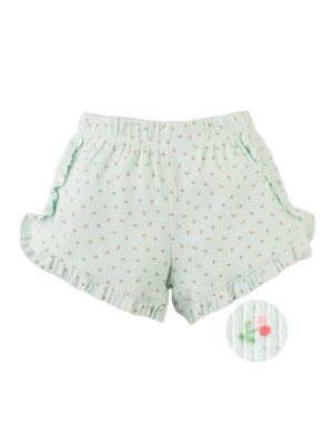 Campaign photo of the Sylvie Shorts with Ruffles from the Pastel Cherry Chic for Girls collection, featuring playful flutter hems and a soft pastel print.