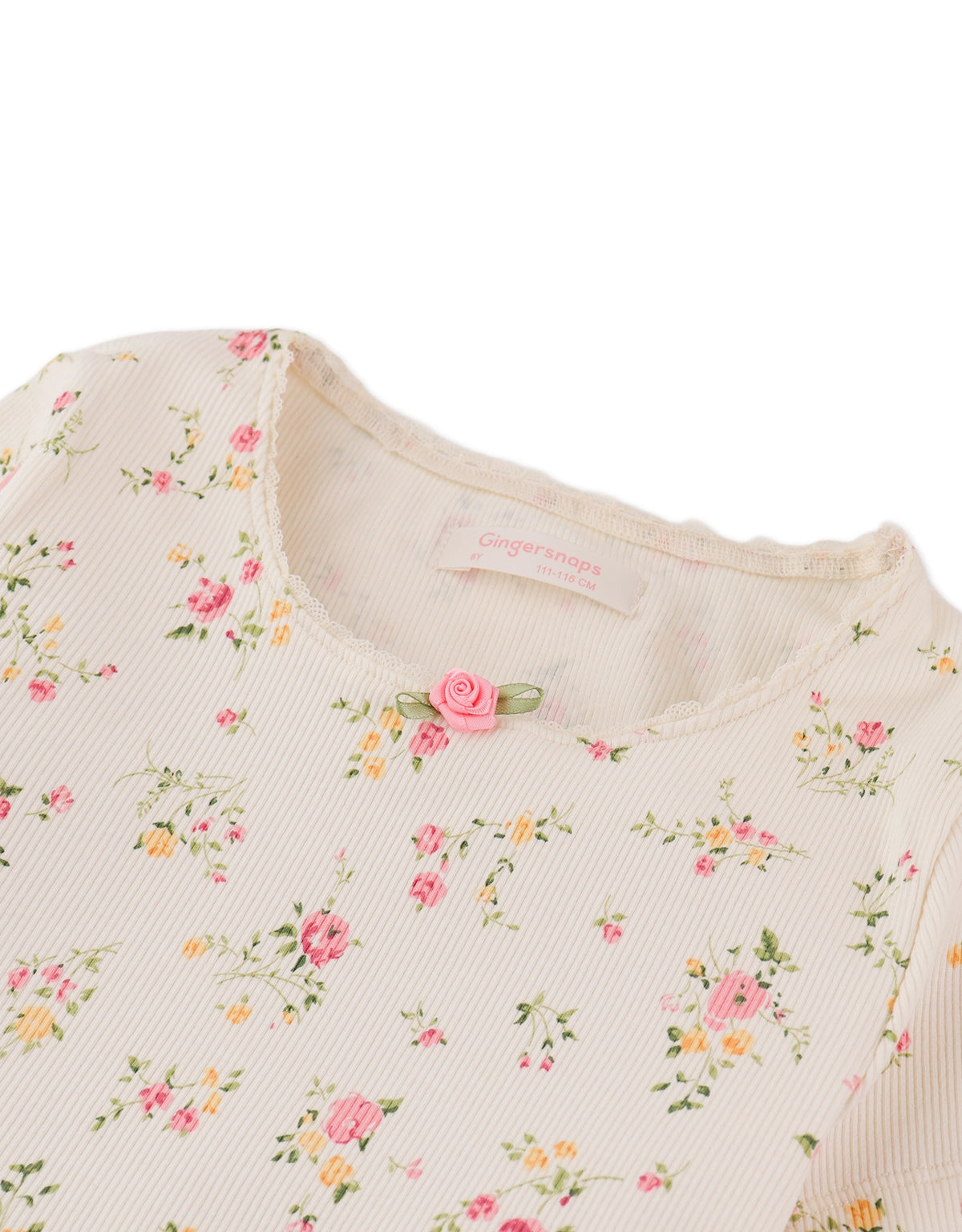DARA ALL-OVER PRINT TOP WITH LACE AND ROSETTE DETAILS