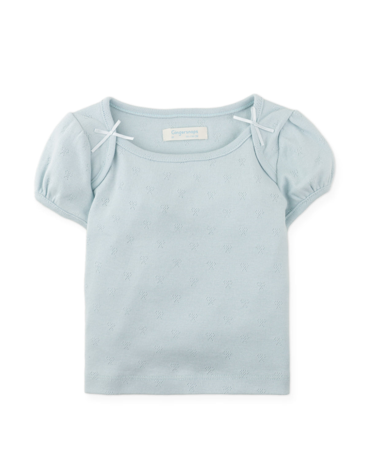 Details front photo of Suzie Cropped Top with bow applique in pastel blue, showing soft fabric texture and delicate bow applique details, from the Holiday collection of Filipino kids fashion brand Gingersnaps Philippines.