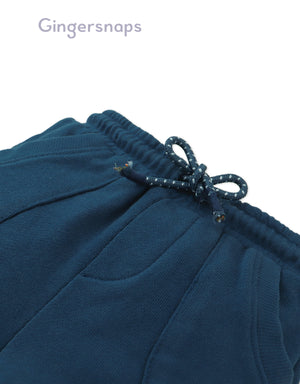 Flatlay front view of the Baby Lenny Pull-On Shorts with Ribbed Details in dark blue showing the pull-on waistband and silhouette from the Streetwear Inspired collection of Filipino kids fashion brand Gingersnaps.