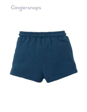 Full back catalog image of the Lenny Pull-On Shorts with Ribbed Details in dark blue worn by young boy model from the streetwear-inspired collection of Gingersnaps Philippines.