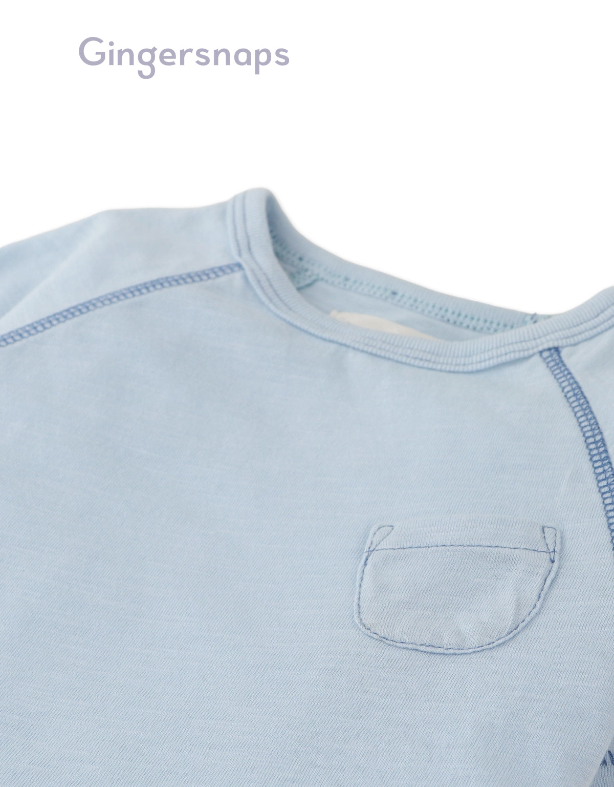 Details front photo of Baby Kevin Jersey Raglan Tee in blue showing breathable cotton slub fabric and raglan sleeve seams for easy movement, from the Holiday collection of Filipino kids fashion brand Gingersnaps Philippines.