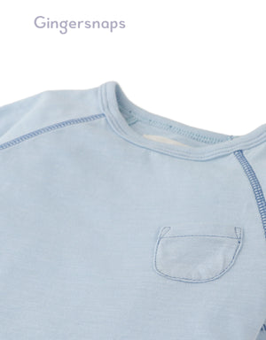 Details front photo of Baby Kevin Jersey Raglan Tee in blue showing breathable cotton slub fabric and raglan sleeve seams for easy movement, from the Holiday collection of Filipino kids fashion brand Gingersnaps Philippines.