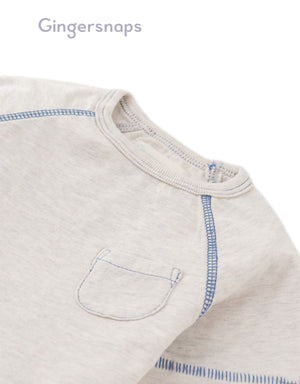 Details front photo of Baby Kevin Jersey Raglan Tee in gray showing breathable cotton slub fabric and raglan sleeve seams for easy movement, from the Holiday collection of Filipino kids fashion brand Gingersnaps Philippines.