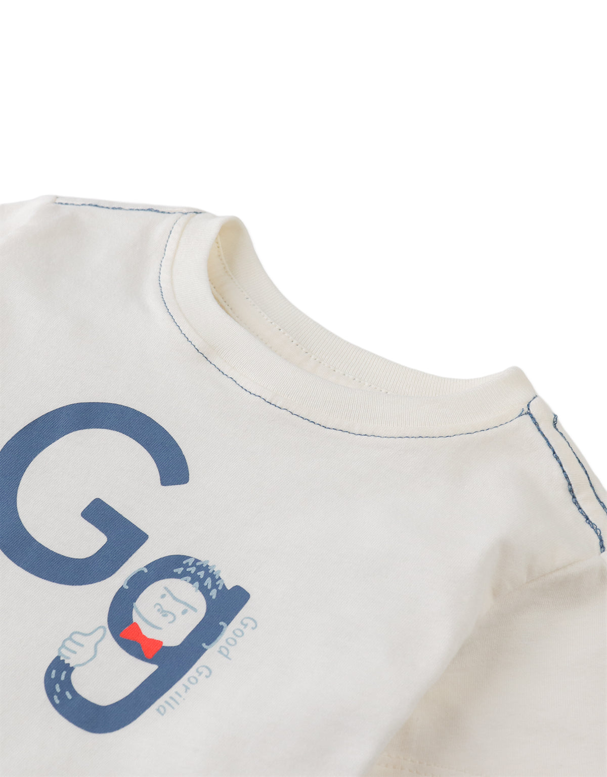 Details front photo of Baby Colby Graphic Tee in white, showing playful jungle-themed graphics and soft cotton texture, from the Holiday collection of Filipino kids fashion brand Gingersnaps Philippines.