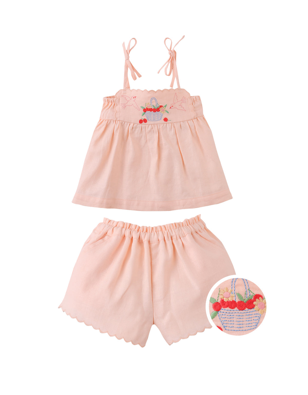 Campaign photo of the Baby Hinata Embroidered Empire Tunic Blouse and Shorts Set for infant girls from the Spring Summer collection of Filipino kids fashion brand Gingersnaps Philippines, featuring an empire-cut tunic blouse paired with matching embroidered shorts.