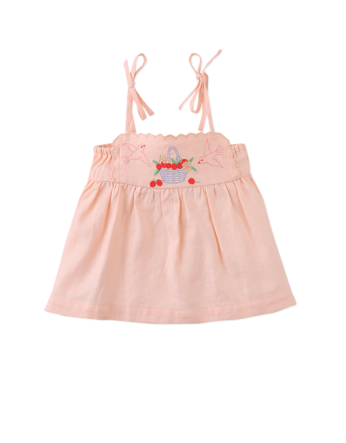 Close-up front detail of the Baby Hinata Embroidered Empire Tunic Blouse and Shorts Set, highlighting embroidered basket and bird motifs from the Spring Summer collection of Gingersnaps Philippines.