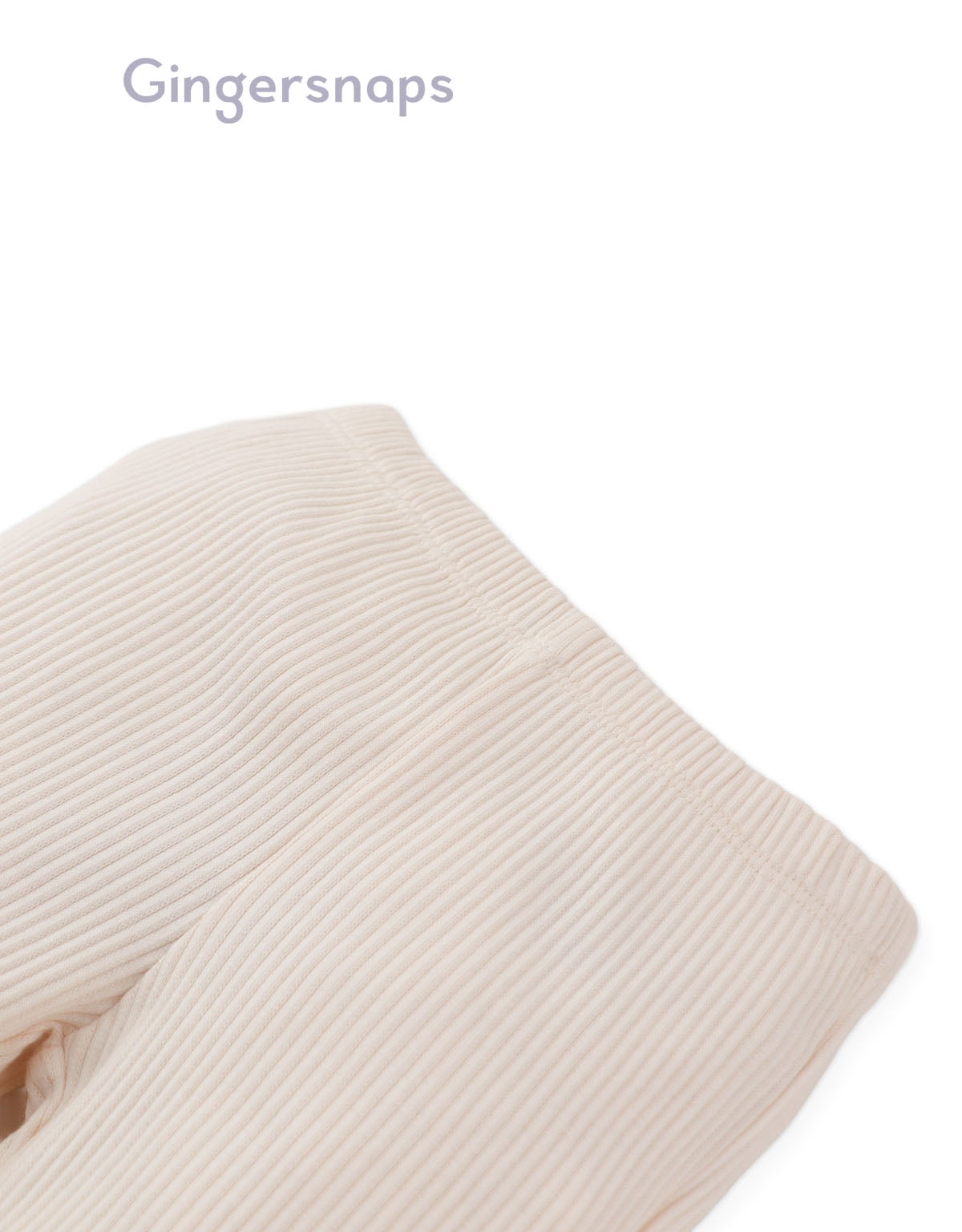Details front photo of Baby Maisie Leggings in off-white showing ribbed texture and elastic waistband from the Holiday collection of Filipino kids fashion brand Gingersnaps Philippines.