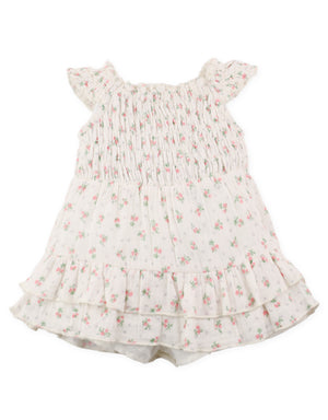 Full back view of floral printed smocked playsuit with ribbon tie accents and inner shorts From Gingersnaps Floral Grace Collection
