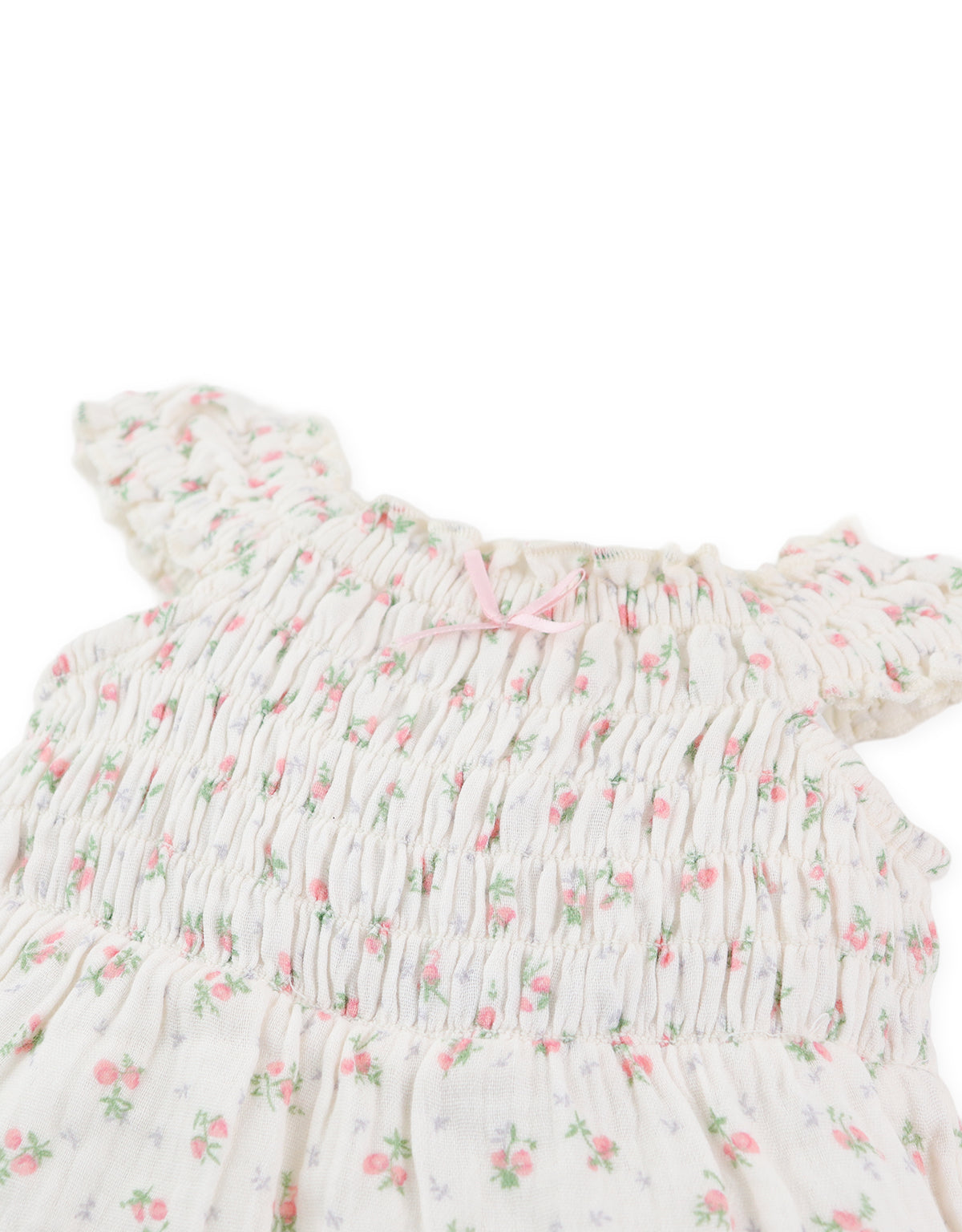 Close-up front detail of floral print smocking with ribbon tie accents From Gingersnaps Floral Grace Collection
