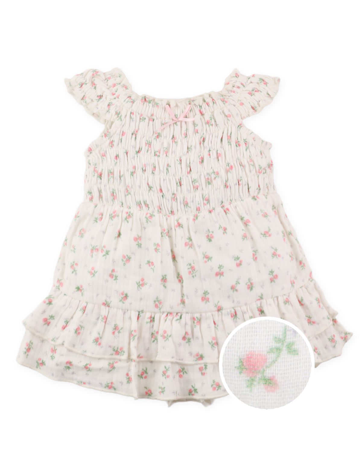 Full front view of floral printed smocked playsuit featuring inner shorts and ribbon tie accents From Gingersnaps Floral Grace Collection