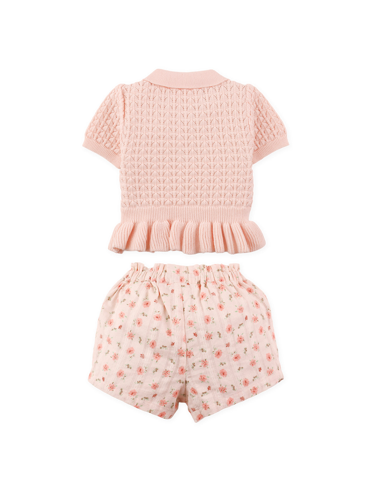 Full back view of knitted peplum top with fitted waist paired with printed shorts From Gingersnaps Floral Grace Collection