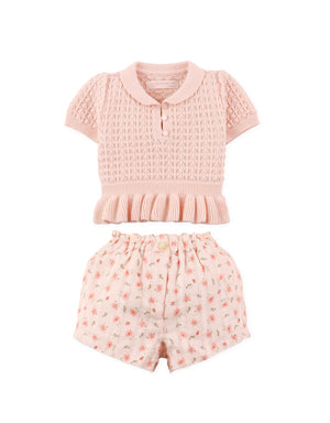 Full front view of pointelle knit peplum top styled with printed shorts set From Gingersnaps Floral Grace Collection
